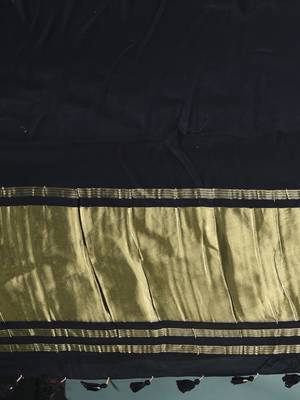 black modal silk blend saree with golden border and tassels 4