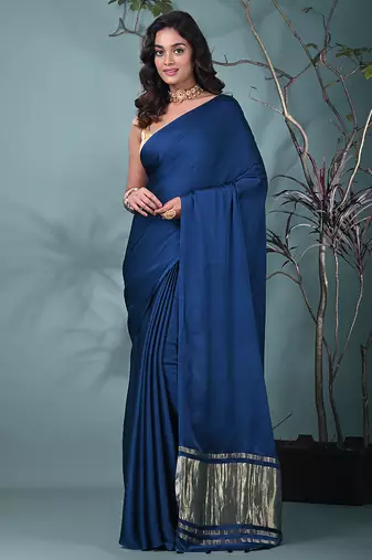 cobalt blue modal silk blend saree with golden border and tassels