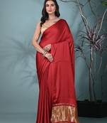 red modal silk blend saree with golden border and tassels