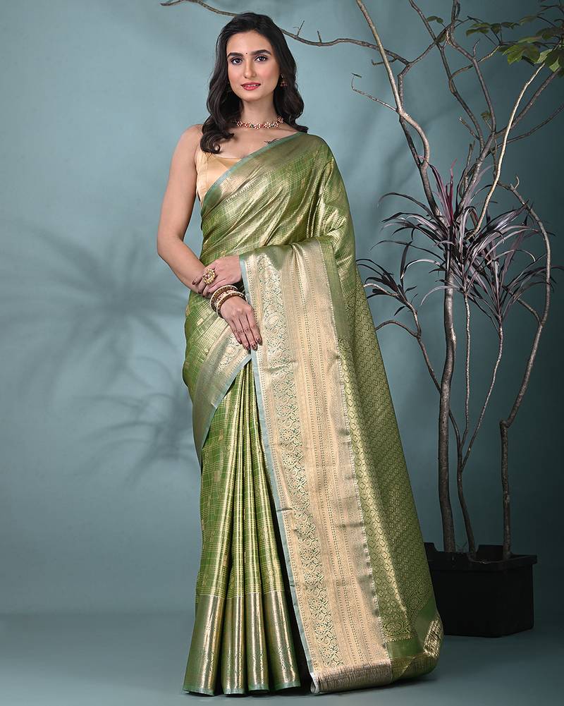 green tissue silk blend kanjivaram saree with intricate border