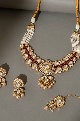Gold plated kundan red stones necklace set