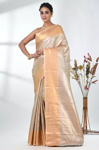 beige tissue silk blend kanjivaram saree with intricate border