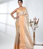 beige tissue silk blend kanjivaram saree with intricate border