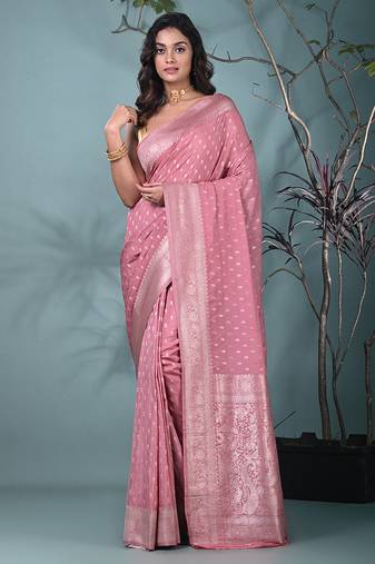 elegant nude pink georgette saree with intricate silver zari work