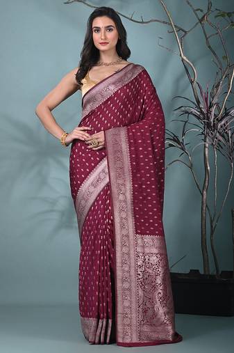 elegant fuchsia georgette saree with intricate silver zari work