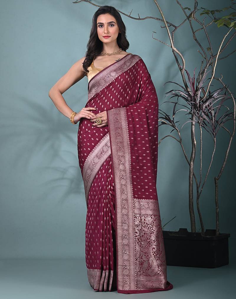 elegant fuchsia georgette saree with intricate silver zari work