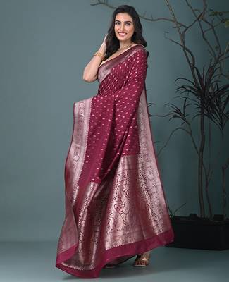 elegant fuchsia georgette saree with intricate silver zari work 2