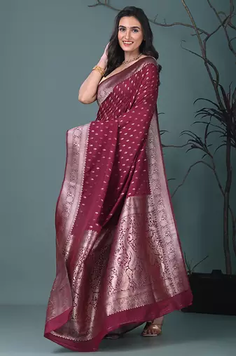 elegant fuchsia georgette saree with intricate silver zari work