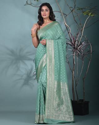 elegant sea green georgette saree with intricate silver zari work 1