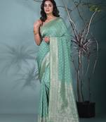 elegant sea green georgette saree with intricate silver zari work