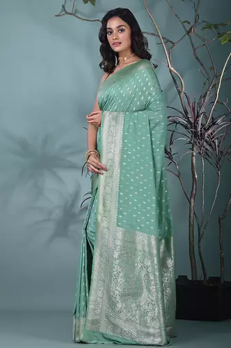 elegant sea green georgette saree with intricate silver zari work