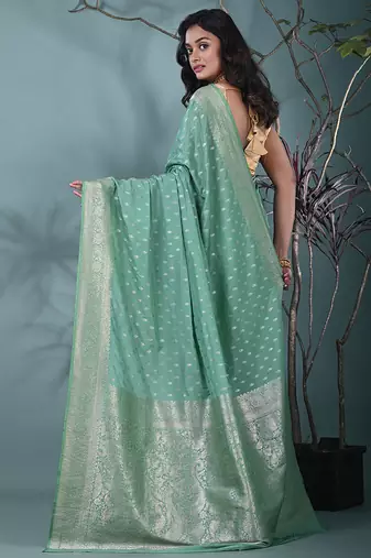 elegant sea green georgette saree with intricate silver zari work