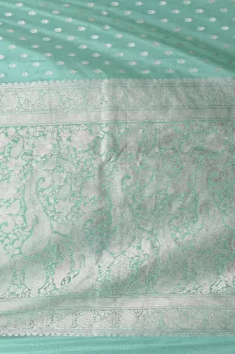 elegant sea green georgette saree with intricate silver zari work