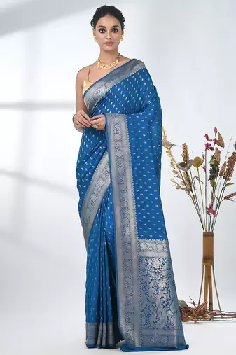 elegant sky blue georgette saree with intricate silver zari work