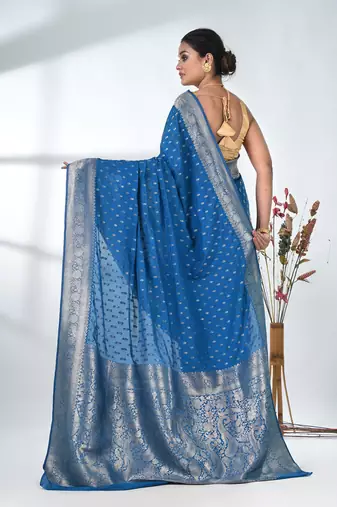 elegant sky blue georgette saree with intricate silver zari work