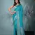 elegant turquoise blue georgette saree with intricate silver zari work