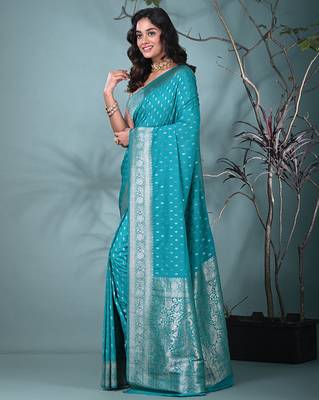 elegant turquoise blue georgette saree with intricate silver zari work 2