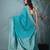 elegant turquoise blue georgette saree with intricate silver zari work