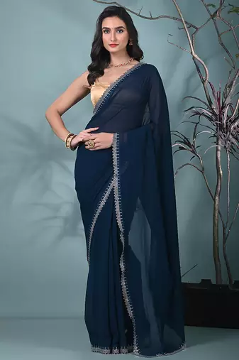 stylish teal chiffon saree with stone work border