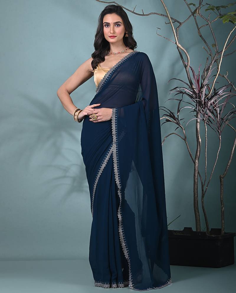 stylish teal chiffon saree with stone work border