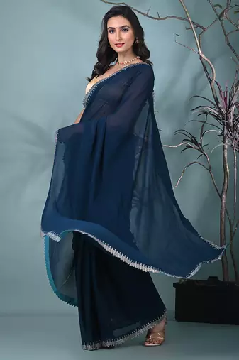 stylish teal chiffon saree with stone work border
