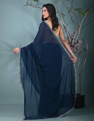 stylish teal chiffon saree with stone work border 3