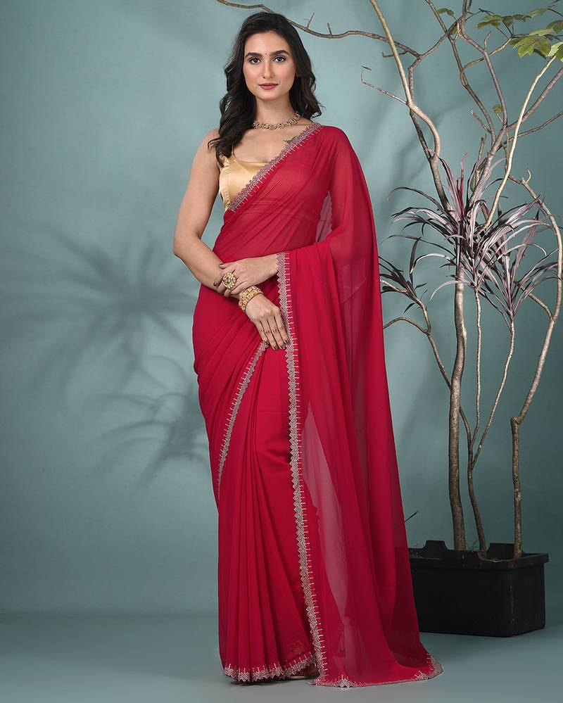 stylish fuchsia chiffon saree with stone work border