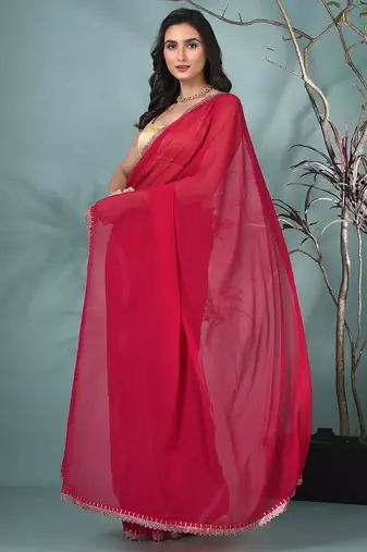 stylish fuchsia chiffon saree with stone work border