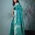 elegant teal silk blend saree with intricate brocade work