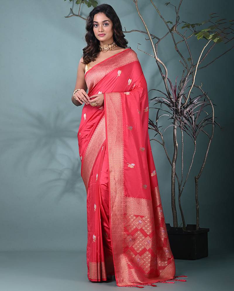 graceful punch pink silk blend blend saree with intricate zari work