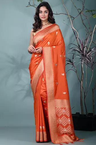 graceful orange silk blend blend saree with intricate zari work