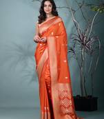 graceful orange silk blend blend saree with intricate zari work