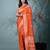 graceful orange silk blend blend saree with intricate zari work