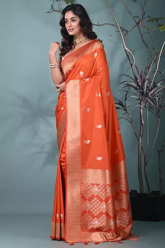 graceful orange silk blend blend saree with intricate zari work
