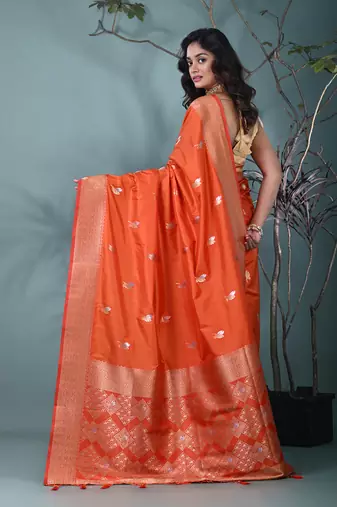 graceful orange silk blend blend saree with intricate zari work