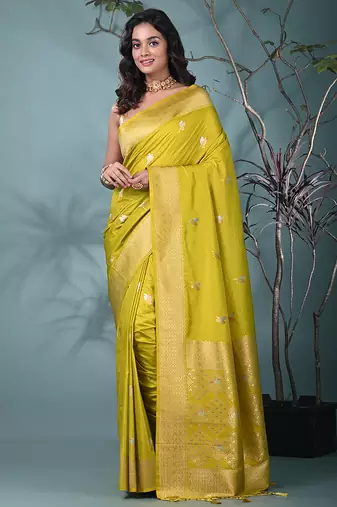 graceful lime green silk blend blend saree with intricate zari work