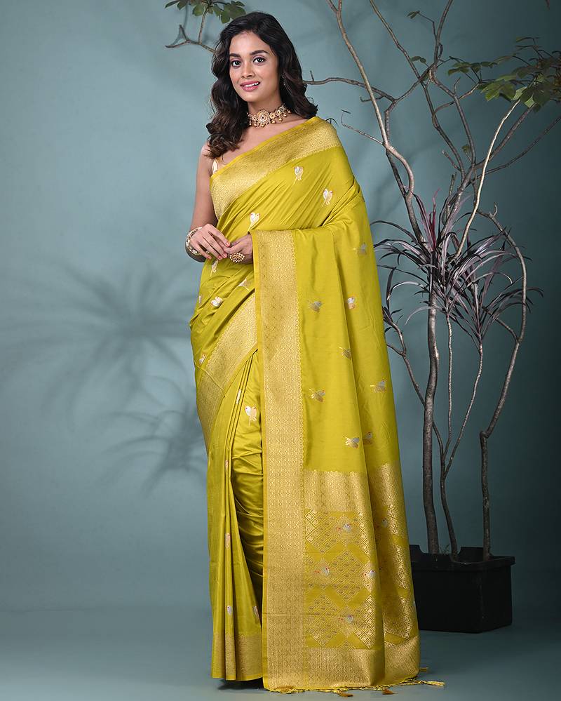 graceful lime green silk blend blend saree with intricate zari work