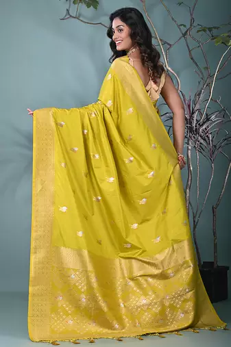 graceful lime green silk blend blend saree with intricate zari work