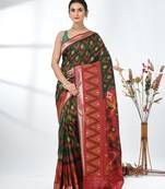 exquisite green pochampally silk blend saree with vibrant ikat pattern