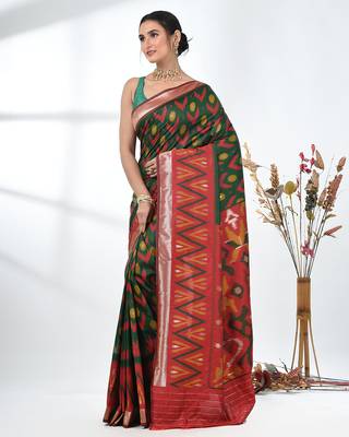 exquisite green pochampally silk blend saree with vibrant ikat pattern 2