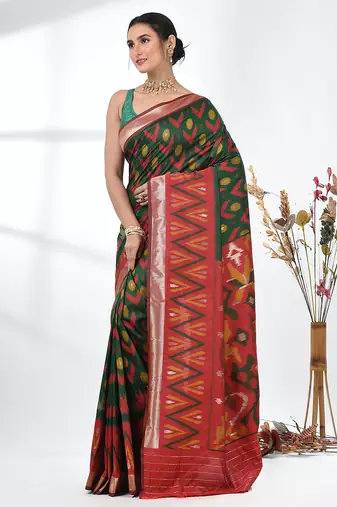exquisite green pochampally silk blend saree with vibrant ikat pattern