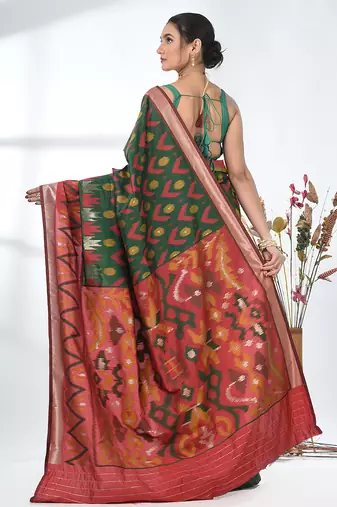 exquisite green pochampally silk blend saree with vibrant ikat pattern