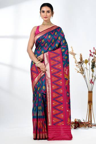 exquisite teal pochampally silk blend saree with vibrant ikat pattern