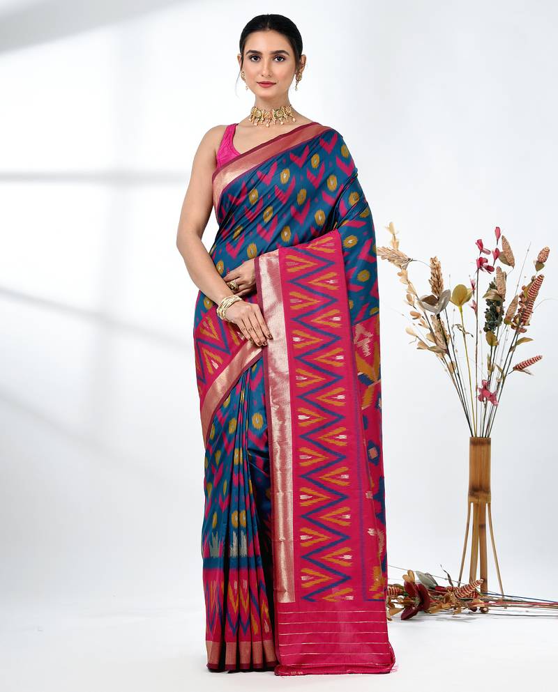exquisite teal pochampally silk blend saree with vibrant ikat pattern