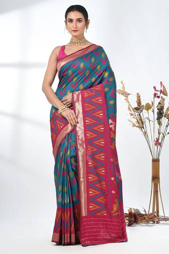 exquisite teal pochampally silk blend saree with vibrant ikat pattern