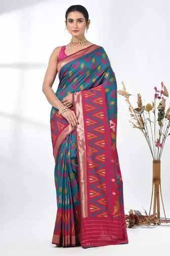 exquisite teal pochampally silk blend saree with vibrant ikat pattern