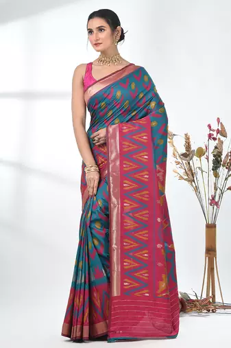 exquisite teal pochampally silk blend saree with vibrant ikat pattern