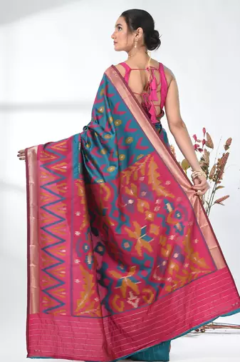 exquisite teal pochampally silk blend saree with vibrant ikat pattern