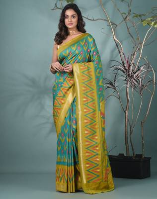 exquisite turquoise blue pochampally silk blend saree with vibrant ikat pattern 1