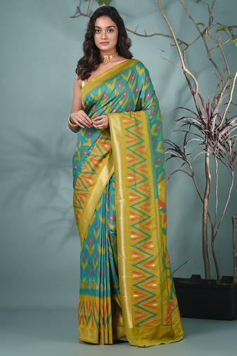 exquisite turquoise blue pochampally silk blend saree with vibrant ikat pattern